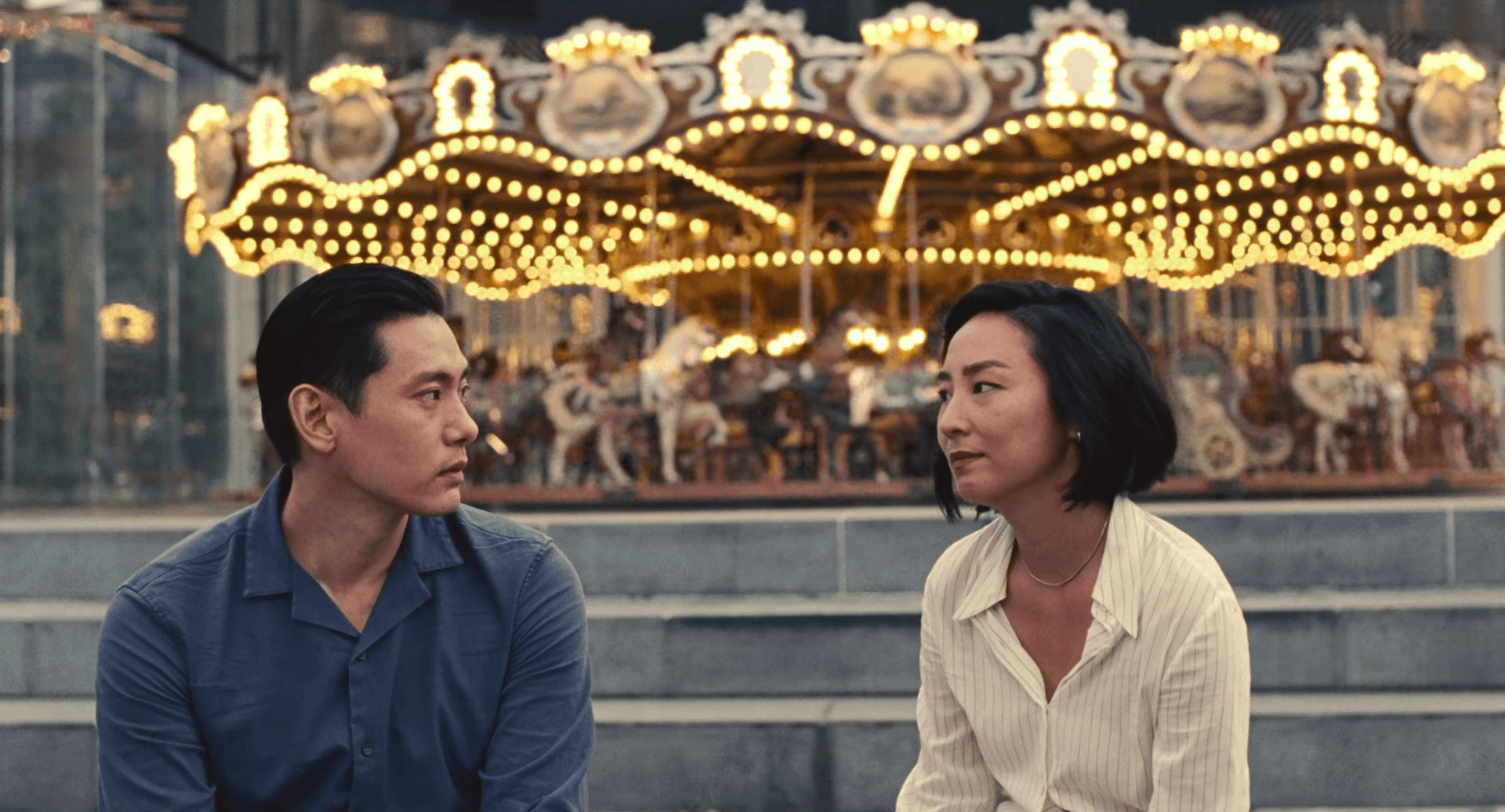 Nora & Hae Sung in front of Jane's Carousel in NYC